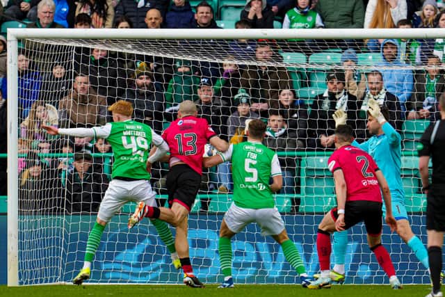 Former Hibs player Alex Gogic opens the scoring against his old side. 