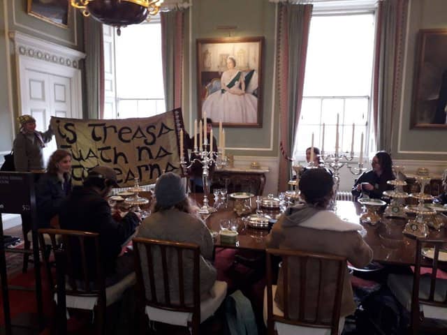 This is Rigged protesters occupy dining room at Holyrood Palace demanding action to tackle food insecurity.