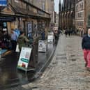 Street ad boards on the Royal Mile. Photo by X user 'Fountainbridge' 