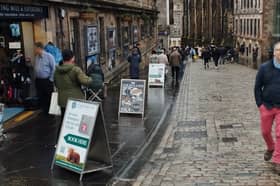 Street ad boards on the Royal Mile. Photo by X user 'Fountainbridge' 