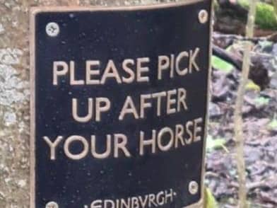The 'fake' sign along the Water of Leith walkway will be removed by the council