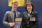 Finlay Johnston helped save the life of a motorist who was trapped under a vehicle and bleeding 