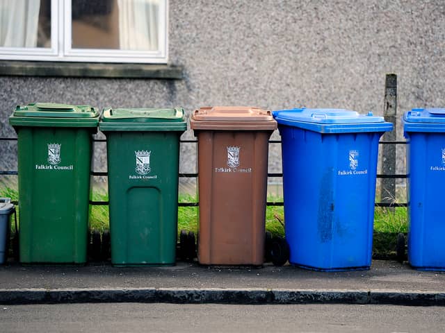 Different colours of bins in different parts of Scotland can cause confusion, say MSPs.  Picture Michael Gillen.