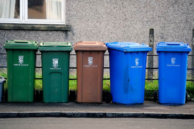 Different coloured bins in different parts of Scotland can cause confusion, say MSPs.  Picture: Michael Gillen.