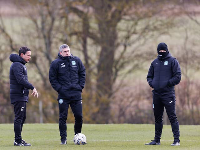 Montgomery (centre) at training this morning.