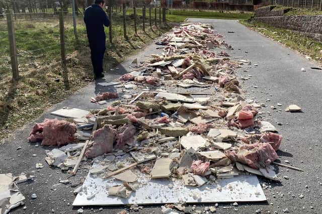 Fly-tipping is a widespread problem in the Lothians. This was an example at Glencorse water treatment works in Midlothian - two vans drove up and, in broad daylight, dumped a large amount of material including plaster board, insulation and timber on the access road.