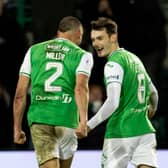 It's good to be back: Lewis Miller celebrates with Dylan Levitt at Easter Road.