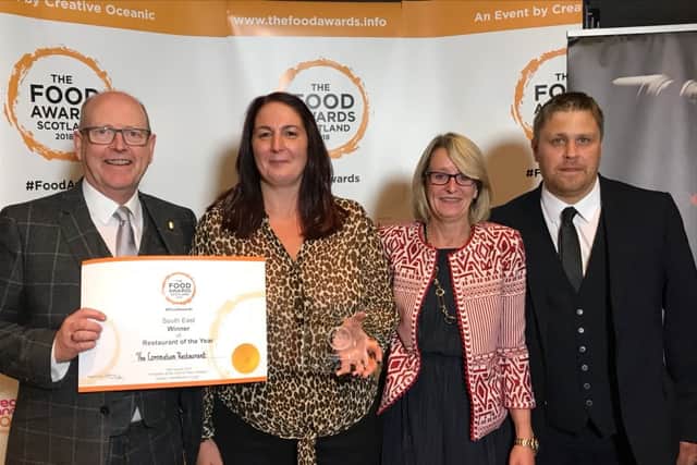Stock photo of staff from the Coronation restaurant in Gorebridge with their Food Awards Scotland regional certificate and national award in 2018.