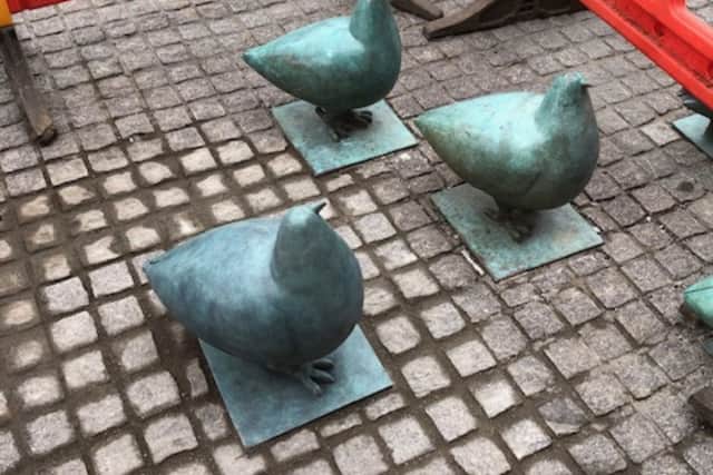 The Elm Row pigeon sculpture has returned to its rightful place