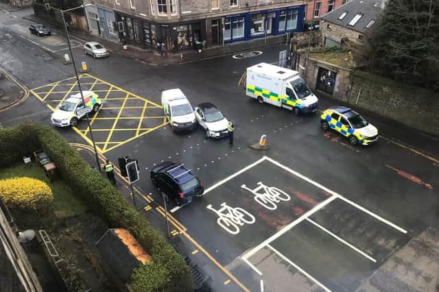 The scene at the junction of Dalkeith Road, East Mayfield and Priestfield Road just after noon on Monday, March 11 after an ambulance collided with a white car.