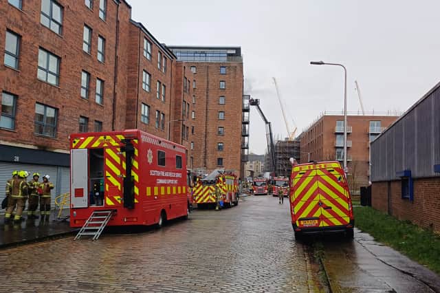 Fire crews remain at scene after blaze in block of flats in Leith saw 100 residents evacuated 