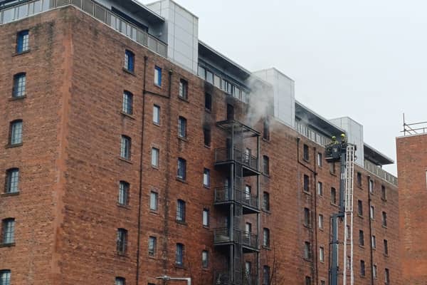 Crews are still on the scene after a fire broke out in a block of flats on Breadalbane Street in Leith
