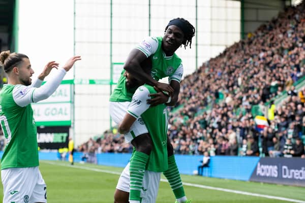 Emi Marcondes, Elie Youan and Myziane Maolida celebrating after the Comoros international scored to put Hibs 2-0 up on Livi.