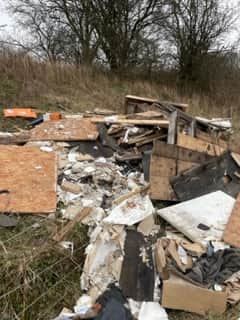 Fly-tipped building waste at countryside in South Queensferry 