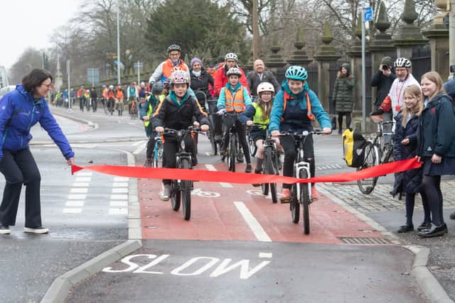 Pupils from local primary schools pedalled through a ribbon to mark the official opening of the new route.