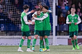 Lewis Stevenson is congratulated by his team-mates after opening the scoring with a screamer. 