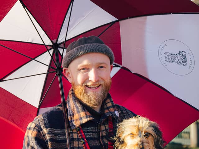 Calum Ferguson of Bobby's tours and his pup Rowie, who looks just like the world-famous Greyfriars Bobby dog 