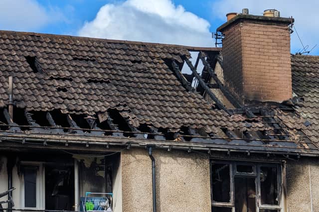The fire damaged this roof at Telford Drive this morning. Photo by Vicky Nicolson.