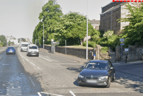 Man dies after crash on busy Edinburgh road, while passenger remains in critical condition