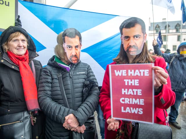 Campaigners gather outside the Scottish Parliament at Holyrood in Edinburgh, to mark the introduction of the Hate Crime and Public Order (Scotland) Act. Photo: Lesley Martin/PA Wire
