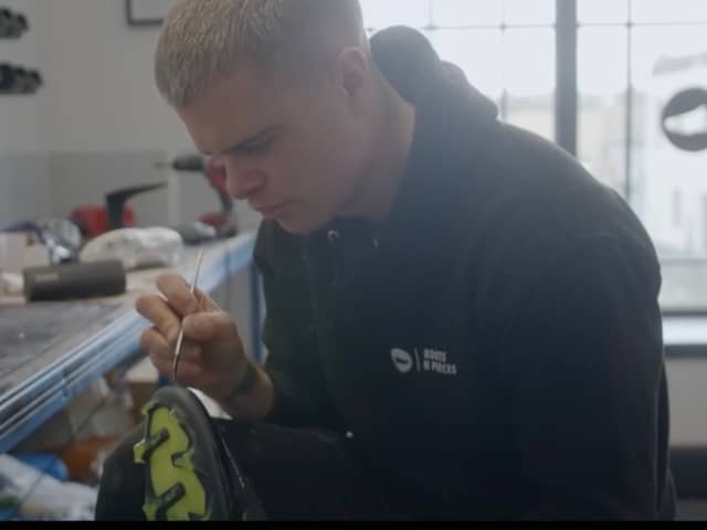 Boots N Pieces founder Ryan Park hard at work in his Leith office converting football boots.