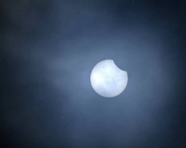 The partial eclipse above Scotland in 2021. Photo by Michael Gillen.