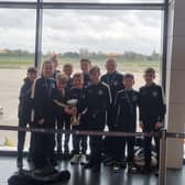The Edinburgh City Academy 2012s with the Belgian Cup they won last weekend in a youth football tournament against teams for all over Europe.