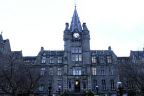 The Victorian facade and clock tower of the old Royal Infirmary building on Lauriston Place, Edinburgh ahead of the   hospital's move to Little France. 