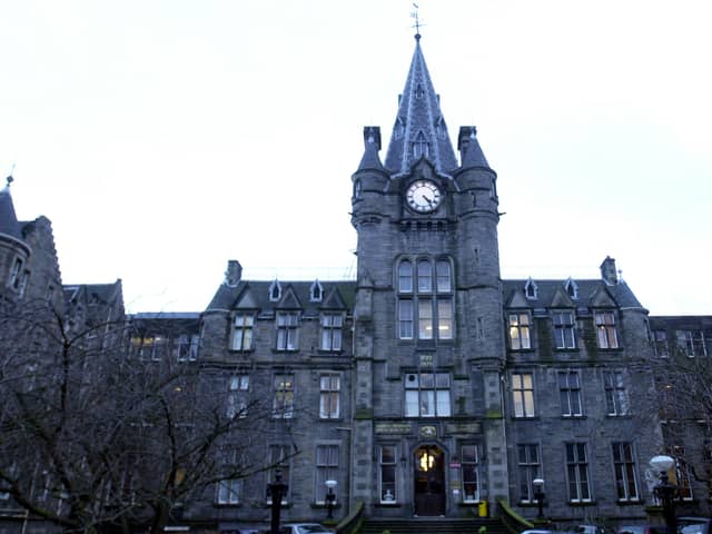 The Victorian facade and clock tower of the old Royal Infirmary building on Lauriston Place, Edinburgh ahead of the   hospital's move to Little France. 