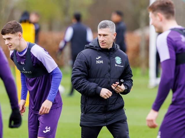 Montgomery, pictured at training today, is determined to keep pressure on with result against Motherwell.