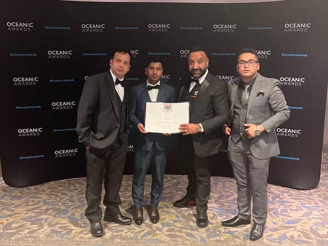 Bombay Lounge staff Mr Aminul, Mr Rahat and Mr Ali (left to right) with manager Michael Singh (second from right), collect their Scottish Curry Award.