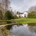 The extensive gardens will be appealing to families and the keen gardener and encompass a large pond which attracts a variety of wildlife, mature natural planting, areas of lawn, along with a sheltered stone patio, fruit cages and woodland garden.
