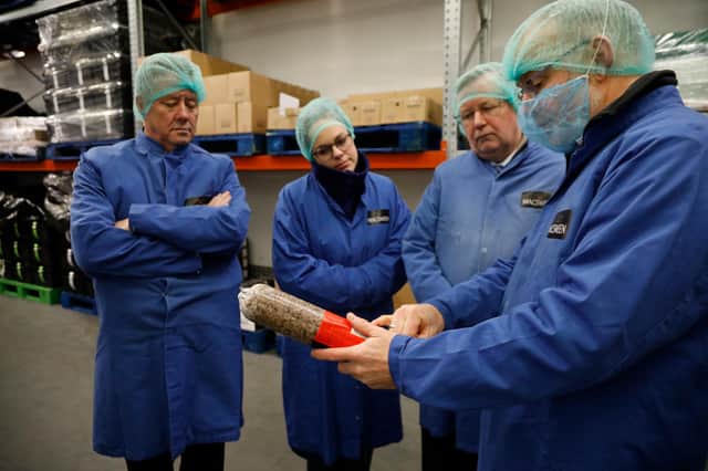 MSPs Keith Brown, Kate Forbes and Alexander Stewart wit James Macsween at the Macsween warehouse in Loanhead.
Picture: Andrew Cowan/Scottish Parliament