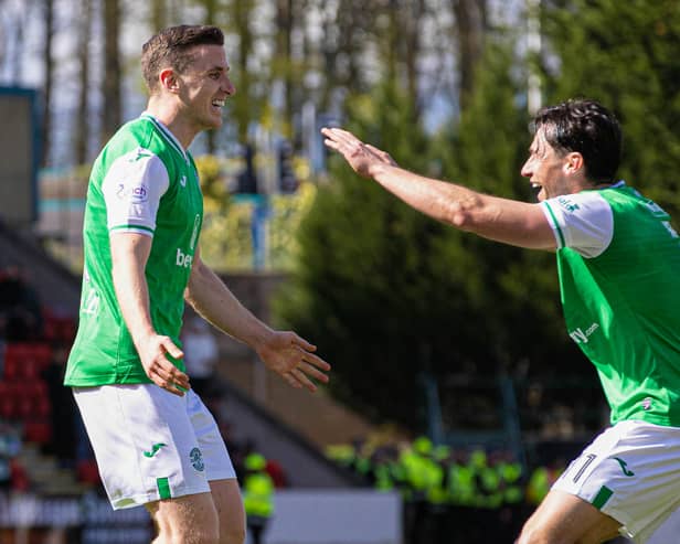 O captain, my captain! Stand-in skipper Joe Newell is the first to congratulate Paul Hanlon on his goal. 