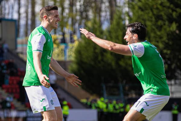 O captain, my captain! Stand-in skipper Joe Newell is the first to congratulate Paul Hanlon on his goal. 