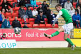 Frustration released - Vente smashes the ball home to make it 3-0 to Hibs in Perth on Saturday.