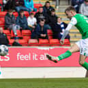 Frustration released - Vente smashes the ball home to make it 3-0 to Hibs in Perth on Saturday.