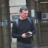 Former Hibs player Graeme Love, 50, pictured outside Edinburgh Sheriff Court, lashed out with his arms and legs in an attempt to evade arrest after officers had been called out to remove him from a property in Leith, Edinburgh.