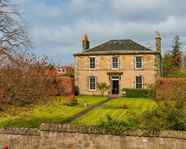 This is an exceptional B-Listed Victorian house, bordered by spectacular lawned gardens and located in the capital's desirable Juniper Green area.