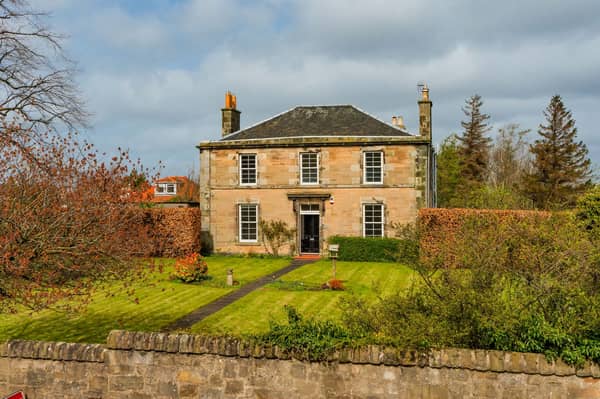 This is an exceptional B-Listed Victorian house, bordered by spectacular lawned gardens and located in the capital's desirable Juniper Green area.