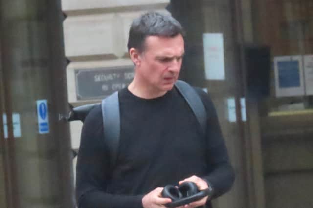 Former Hibs player Graeme Love, 50, pictured outside Edinburgh Sheriff Court, lashed out with his arms and legs in an attempt to evade arrest after officers had been called out to remove him from a property in Leith, Edinburgh