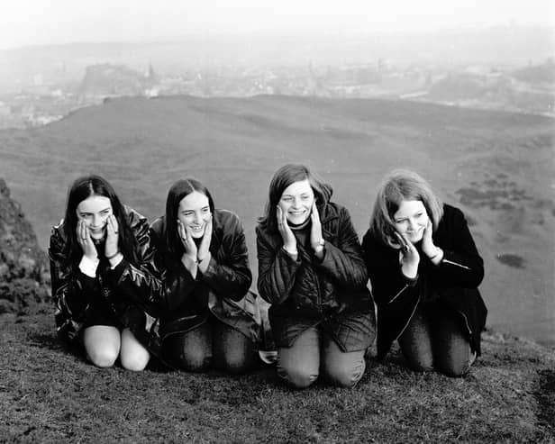 Four girls wash their faces in the dew at the top of Arthur's Seat Edinburgh on May Day 1969