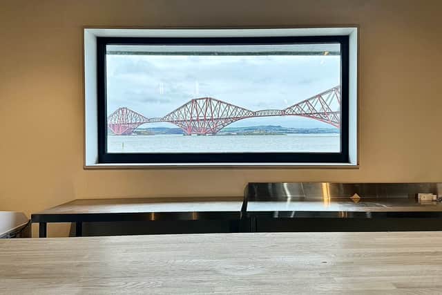 No that isn't a photo of the Forth rail bridge on the wall of Dune Bakery in South Queensferry, it's a window looking out across the Firth of Forth.