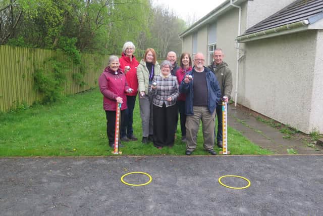 In the picture from left to right are: Crafters Anne Russell and Lynne Morris, Councillor Kelly Drummond, Councillor Ellen Scott, Councillor Douglas Bowen, crafter Norma McDonald; Sandy Howden and Midlothian Council’s Land Resources Manager James Kinch.