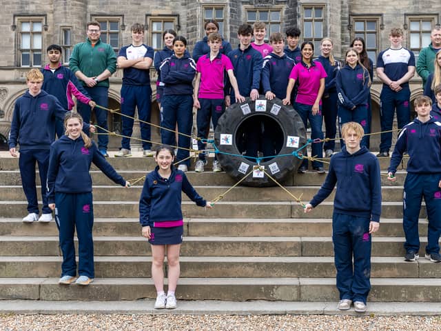 The Fettes students taking part in the 24-hour tyre drag to raise money for charity this weekend.