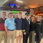 United Airlines pilot Joe Fox with his family at Edinburgh Airport
