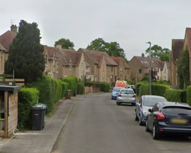 A woman has died following a disturbance at an Edinburgh property.