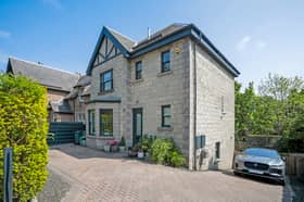 This detached home is up for sale for offers over £575,000.