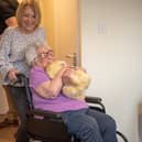 The robotic companion pet at  Bield Housing & Care's tech hub in Linlithgow brings joy to all ages, especially those with Alzheimer's and dementia.