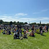 Festival-goers basked in the sun as many enjoyed picnics, drinks and the live music. 